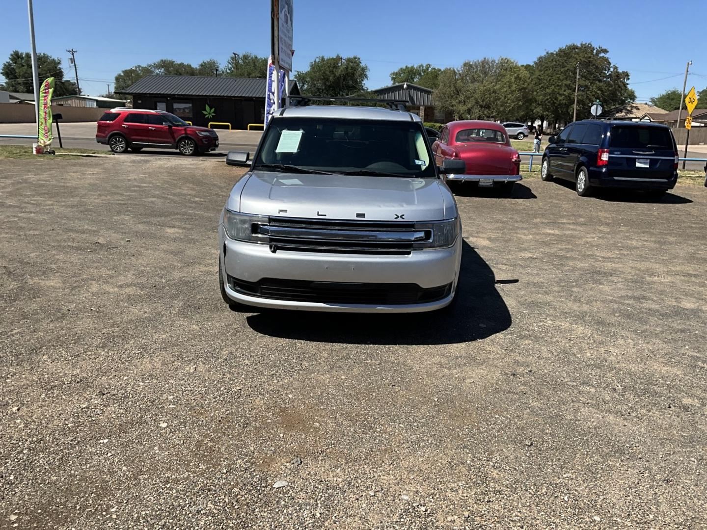 2014 Silver Ford Flex SE FWD (2FMGK5B83EB) with an 3.5L V6 DOHC 24V engine, 6-Speed Automatic Overdrive transmission, located at 821 N. Prince Street, Clovis, NM, 88101, (575) 762-8852, 34.406643, -103.195999- Photo#2