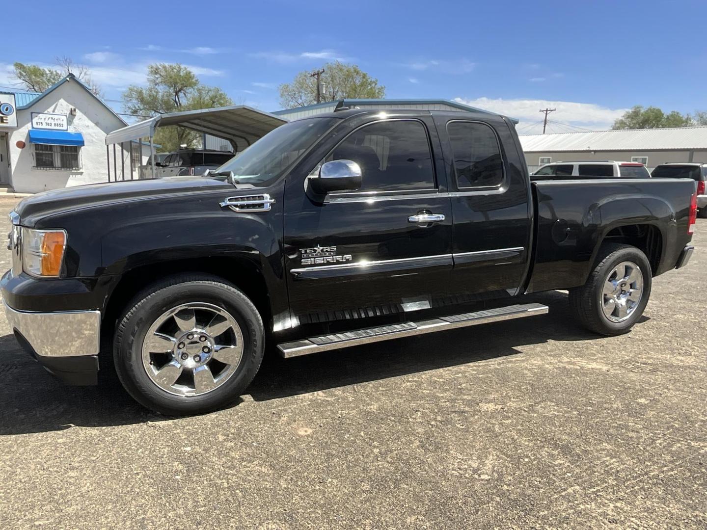2009 Black GMC Sierra 1500 SLE1 Ext. Cab Long Box 2WD (1GTEC29019Z) with an 5.3L V8 OHV 16V FFV engine, 4-Speed Automatic transmission, located at 821 N. Prince Street, Clovis, NM, 88101, (575) 762-8852, 34.406643, -103.195999 - Photo#1