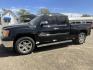 2009 Black GMC Sierra 1500 SLE1 Ext. Cab Long Box 2WD (1GTEC29019Z) with an 5.3L V8 OHV 16V FFV engine, 4-Speed Automatic transmission, located at 821 N. Prince Street, Clovis, NM, 88101, (575) 762-8852, 34.406643, -103.195999 - Photo#1