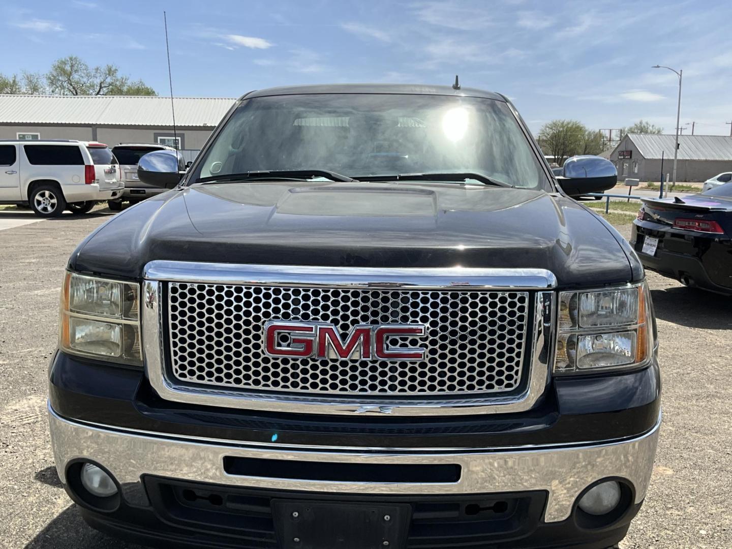2009 Black GMC Sierra 1500 SLE1 Ext. Cab Long Box 2WD (1GTEC29019Z) with an 5.3L V8 OHV 16V FFV engine, 4-Speed Automatic transmission, located at 821 N. Prince Street, Clovis, NM, 88101, (575) 762-8852, 34.406643, -103.195999 - Photo#3