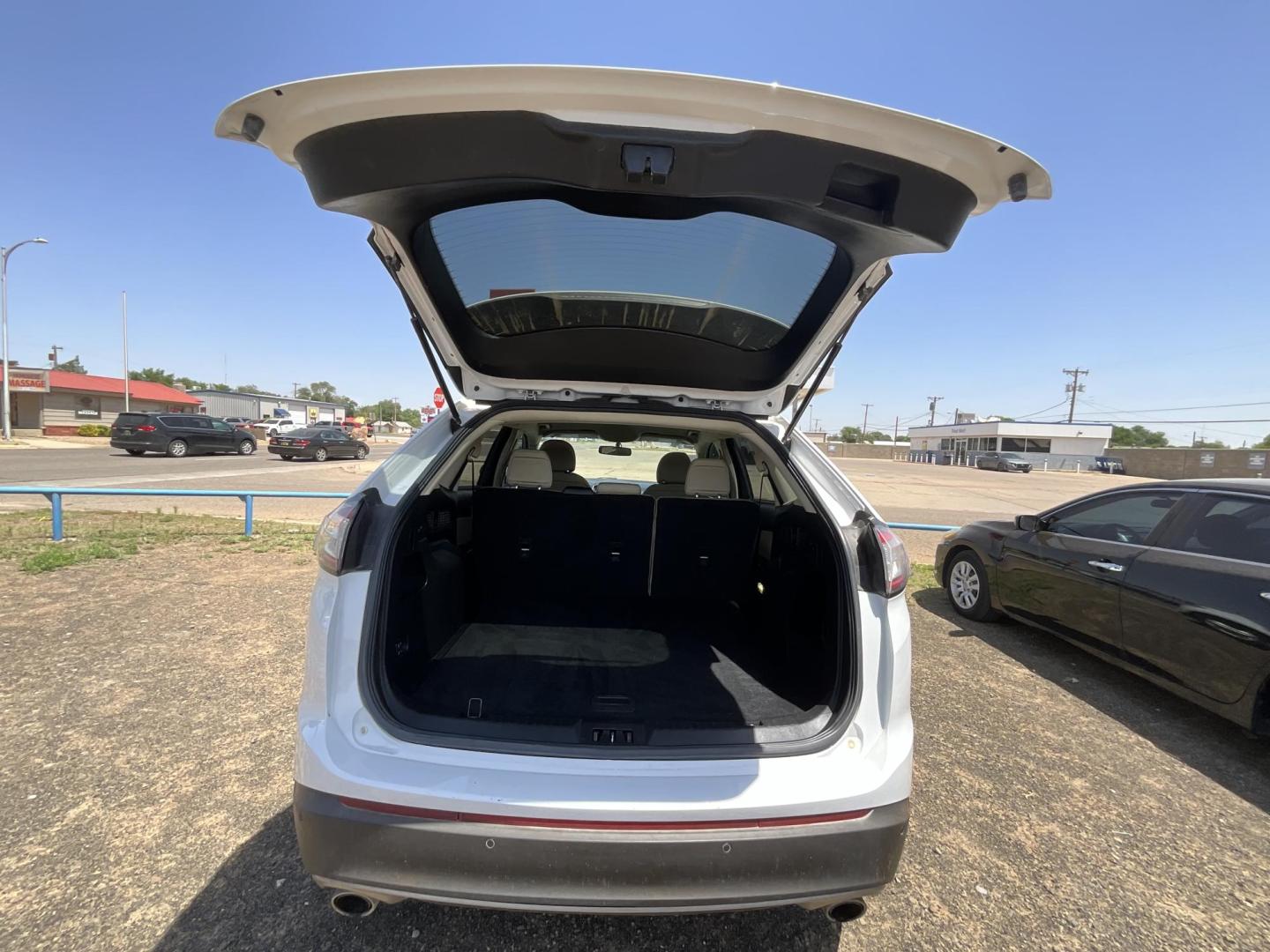 2016 WHITE Ford Edge SEL AWD (2FMPK4J95GB) with an 2.0L L4 DOHC 16V engine, 6A transmission, located at 821 N. Prince Street, Clovis, NM, 88101, (575) 762-8852, 34.406643, -103.195999 - Photo#4