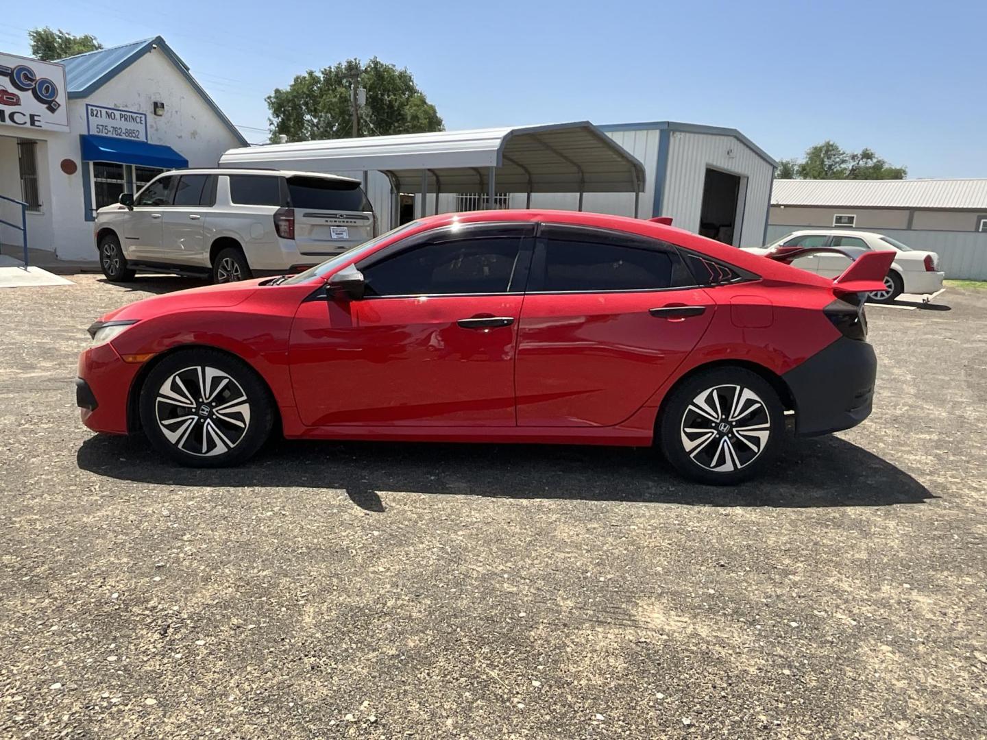 2016 Red /Black Honda Civic EX-T Sedan CVT (2HGFC1F34GH) with an 1.5L L4 DOHC 16V TURBO engine, CVT transmission, located at 821 N. Prince Street, Clovis, NM, 88101, (575) 762-8852, 34.406643, -103.195999 - Photo#3