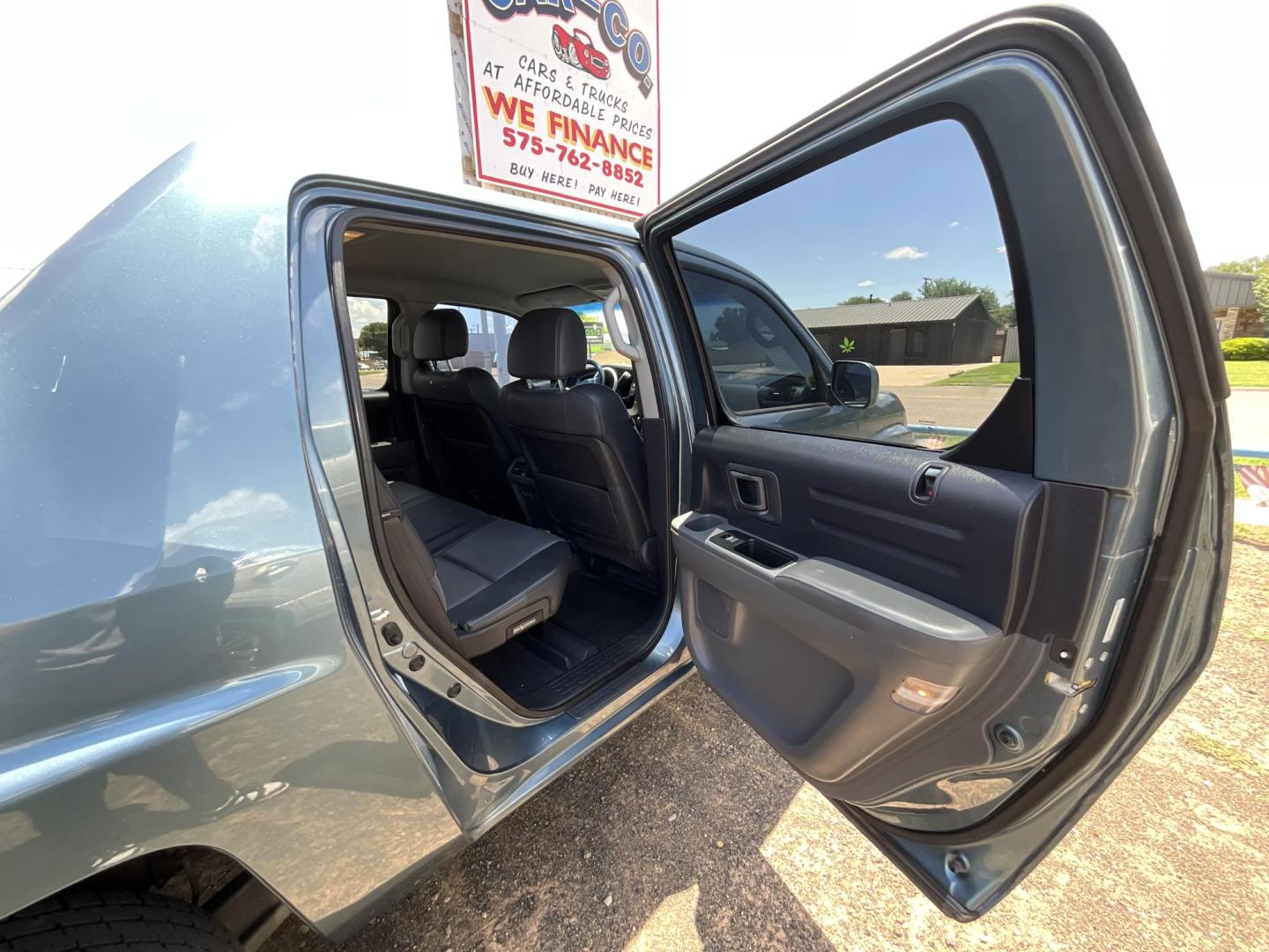 2006 Blue Honda Ridgeline RTL (2HJYK16536H) with an 3.5L V6 SOHC 24V engine, 5-Speed Automatic Overdrive transmission, located at 821 N. Prince Street, Clovis, NM, 88101, (575) 762-8852, 34.406643, -103.195999 - Photo#7