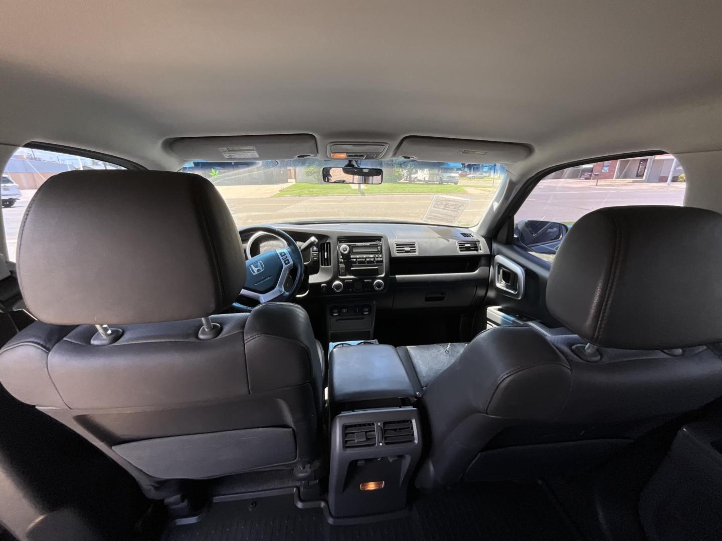 2006 Blue Honda Ridgeline RTL (2HJYK16536H) with an 3.5L V6 SOHC 24V engine, 5-Speed Automatic Overdrive transmission, located at 821 N. Prince Street, Clovis, NM, 88101, (575) 762-8852, 34.406643, -103.195999 - Photo#8