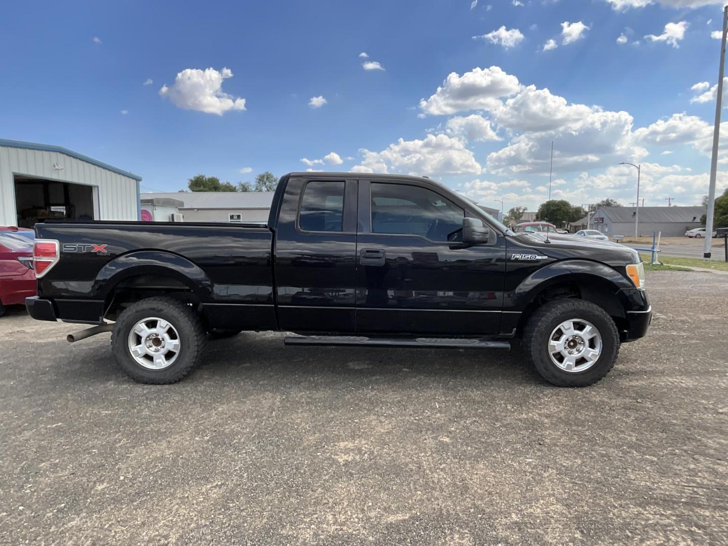 2013 Black Ford F-150 Lariat SuperCab 6.5-ft. Bed 4WD (1FTFX1EF5DK) with an 5.0L V8 engine, 6-Speed Automatic transmission, located at 821 N. Prince Street, Clovis, NM, 88101, (575) 762-8852, 34.406643, -103.195999 - Photo#2