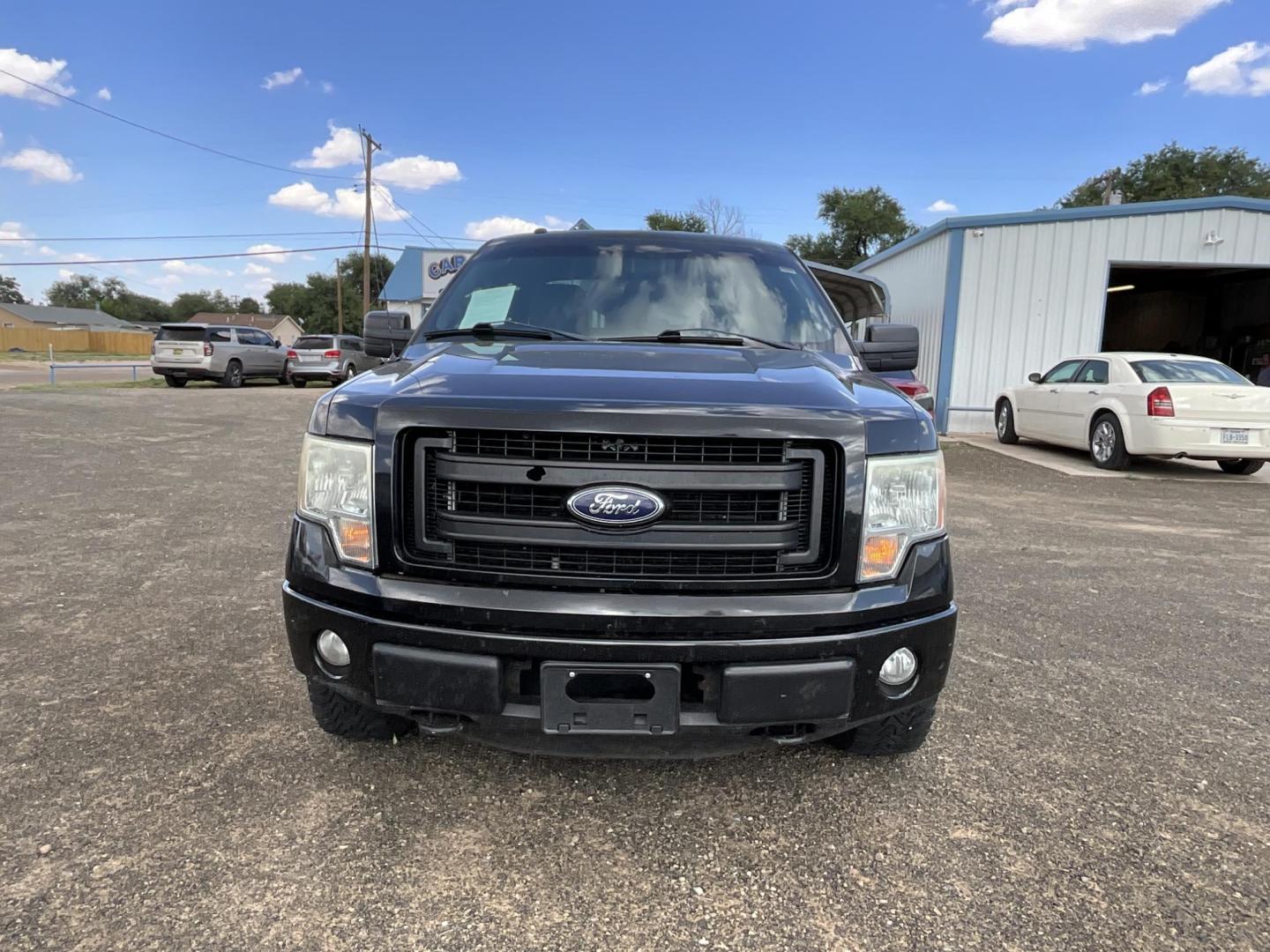 2013 Black Ford F-150 Lariat SuperCab 6.5-ft. Bed 4WD (1FTFX1EF5DK) with an 5.0L V8 engine, 6-Speed Automatic transmission, located at 821 N. Prince Street, Clovis, NM, 88101, (575) 762-8852, 34.406643, -103.195999 - Photo#1