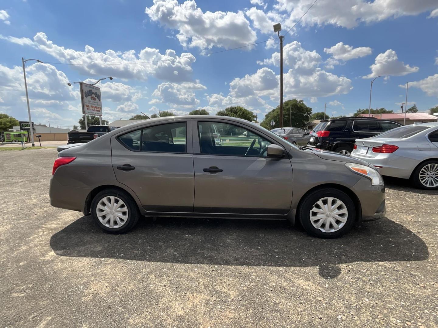 2016 Silver Nissan Versa 1.6 S 5M (3N1CN7AP5GL) with an 1.6L L4 DOHC 16V engine, 5M transmission, located at 821 N. Prince Street, Clovis, NM, 88101, (575) 762-8852, 34.406643, -103.195999 - Photo#2