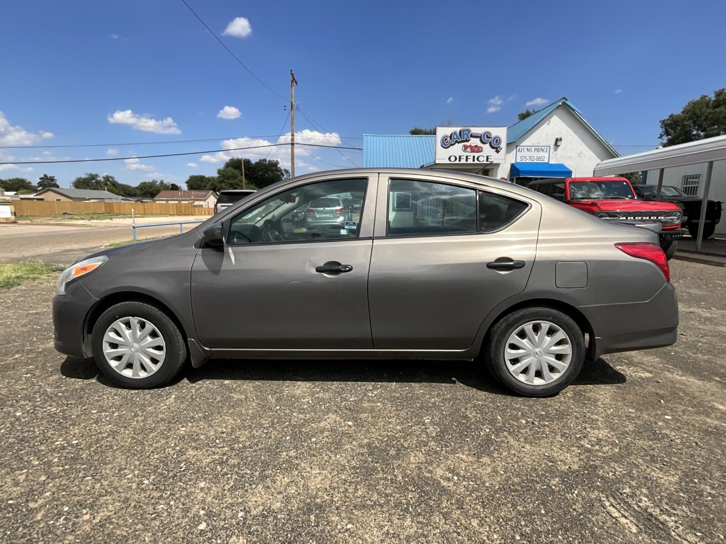 2016 Silver Nissan Versa 1.6 S 5M (3N1CN7AP5GL) with an 1.6L L4 DOHC 16V engine, 5M transmission, located at 821 N. Prince Street, Clovis, NM, 88101, (575) 762-8852, 34.406643, -103.195999 - Photo#0