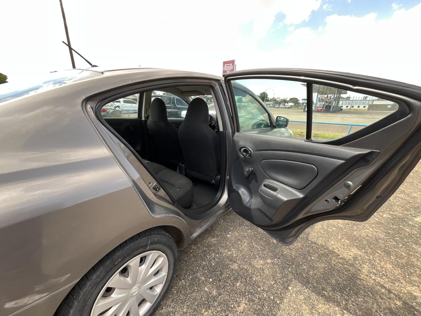2016 Silver Nissan Versa 1.6 S 5M (3N1CN7AP5GL) with an 1.6L L4 DOHC 16V engine, 5M transmission, located at 821 N. Prince Street, Clovis, NM, 88101, (575) 762-8852, 34.406643, -103.195999 - Photo#6