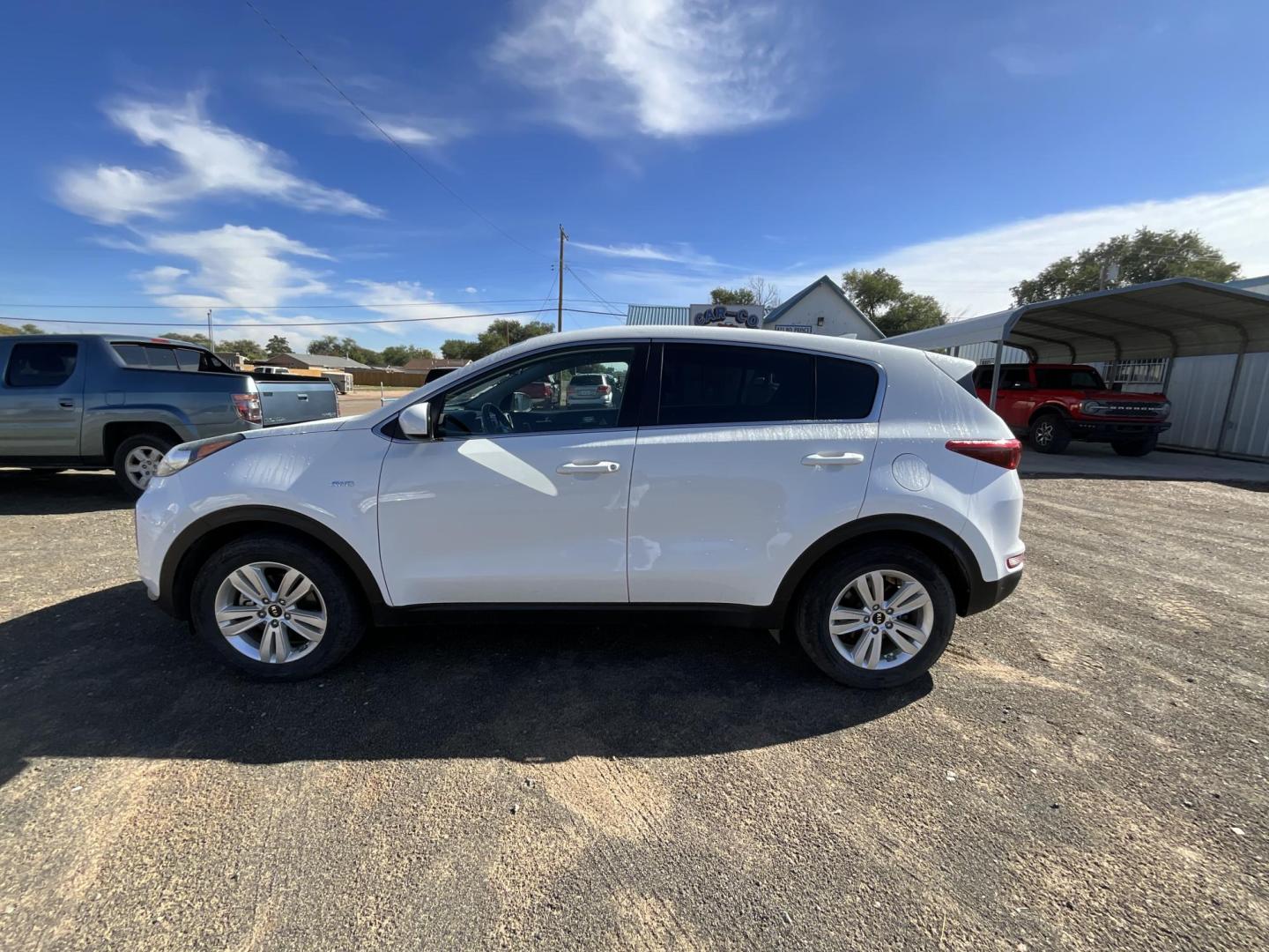 2017 WHITE Kia Sportage LX AWD (KNDPMCAC4H7) with an 2.4L V6 DOHC 24V engine, 6A transmission, located at 821 N. Prince Street, Clovis, NM, 88101, (575) 762-8852, 34.406643, -103.195999 - Photo#2