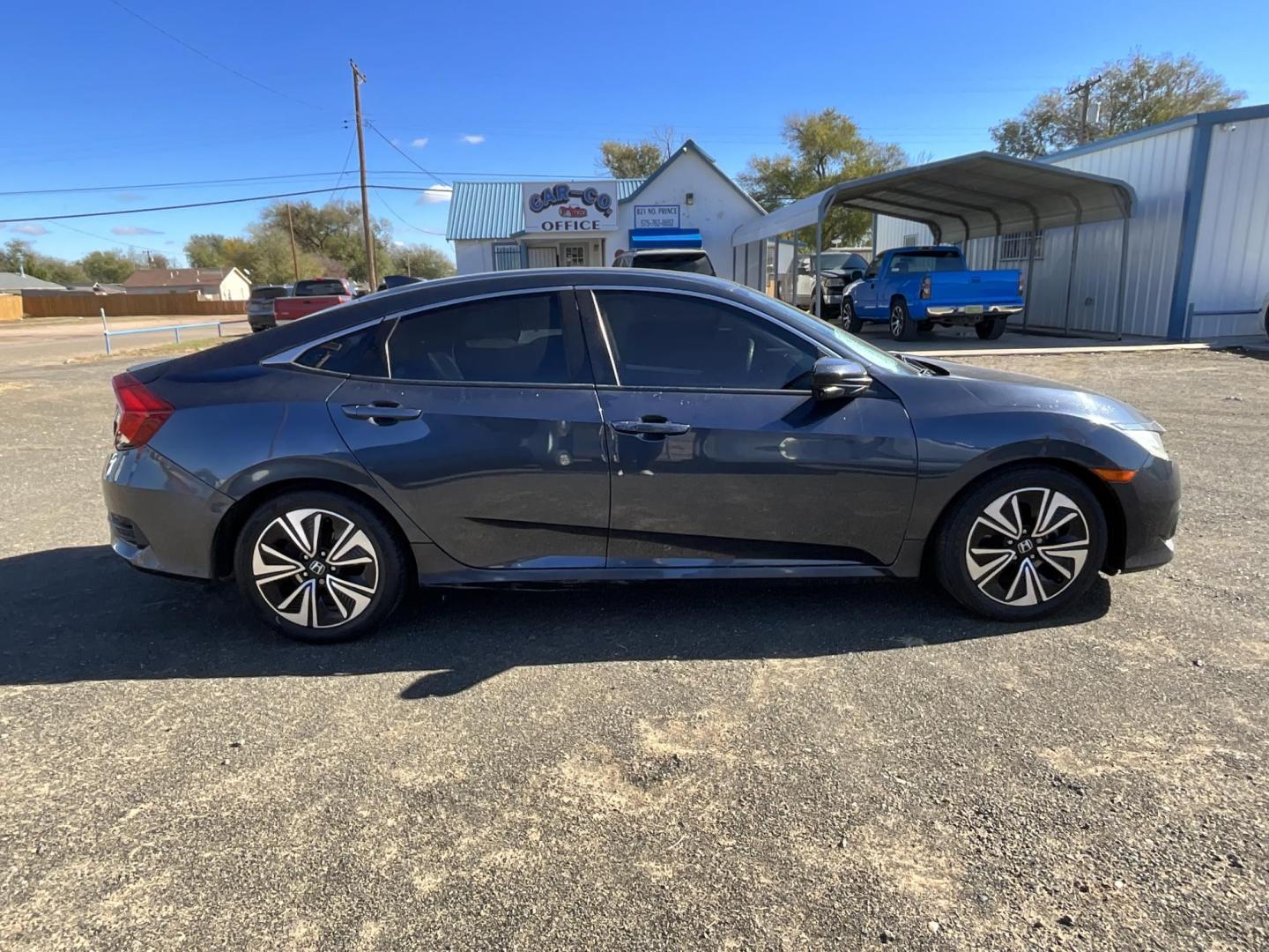 2016 Dark blue Honda Civic EX-T Sedan CVT (19XFC1F3XGE) with an 1.5L L4 DOHC 16V TURBO engine, CVT transmission, located at 821 N. Prince Street, Clovis, NM, 88101, (575) 762-8852, 34.406643, -103.195999 - Photo#2
