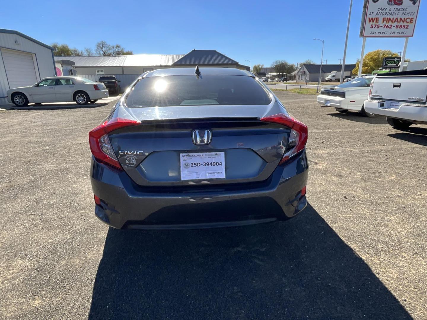 2016 Dark blue Honda Civic EX-T Sedan CVT (19XFC1F3XGE) with an 1.5L L4 DOHC 16V TURBO engine, CVT transmission, located at 821 N. Prince Street, Clovis, NM, 88101, (575) 762-8852, 34.406643, -103.195999 - Photo#1