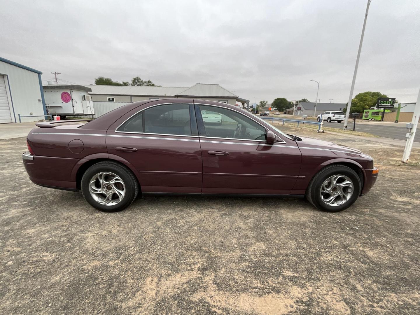 2001 Blue Lincoln LS V8 (1LNHM87A51Y) with an 3.9L V8 DOHC 32V engine, 5-Speed Automatic Overdrive transmission, located at 821 N. Prince Street, Clovis, NM, 88101, (575) 762-8852, 34.406643, -103.195999 - Photo#2