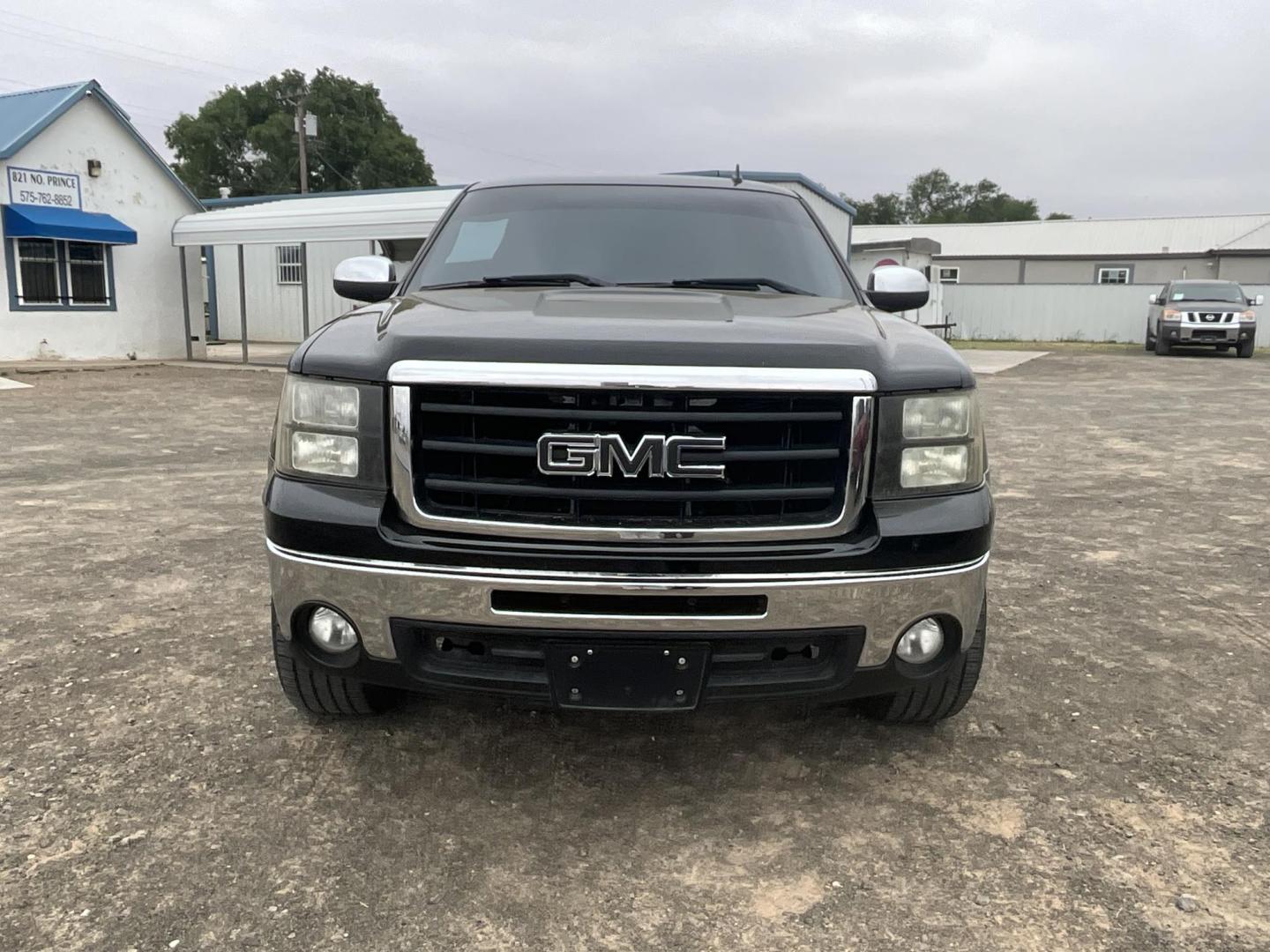 2010 Black GMC Sierra 1500 SLE Ext. Cab 2WD (1GTSCVE05AZ) with an 5.3L V8 OHV 16V FFV engine, 4-Speed Automatic transmission, located at 821 N. Prince Street, Clovis, NM, 88101, (575) 762-8852, 34.406643, -103.195999 - Photo#1