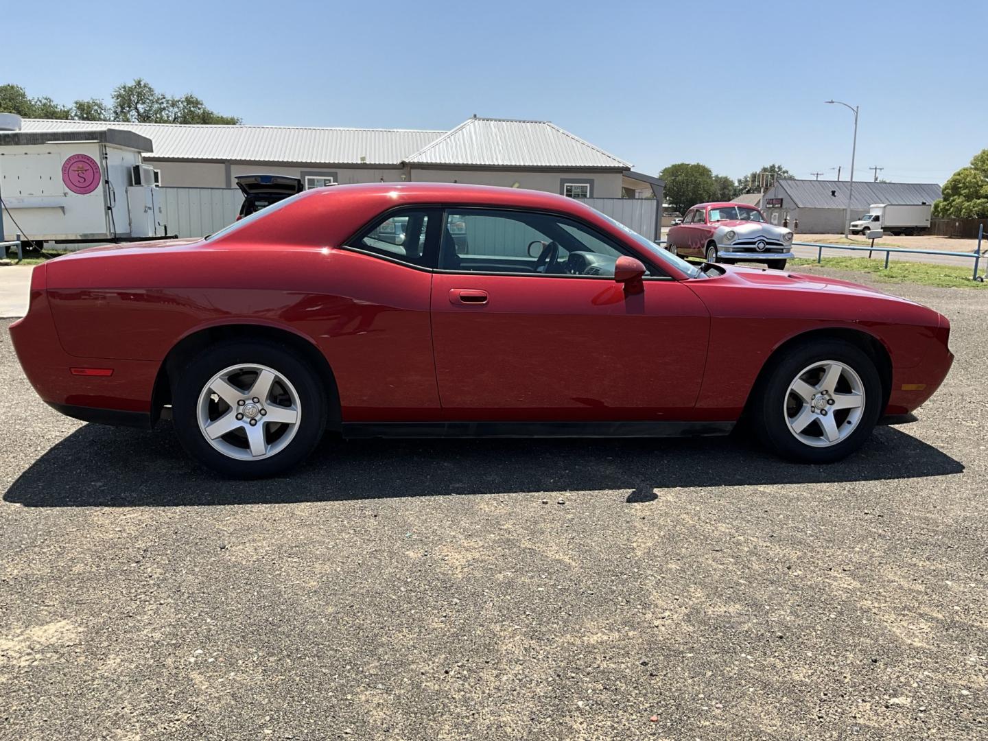 2010 Red Dodge Challenger SE (2B3CJ4DVXAH) with an 3.5L V6 SOHC 24V engine, 4A transmission, located at 821 N. Prince Street, Clovis, NM, 88101, (575) 762-8852, 34.406643, -103.195999- Photo#0