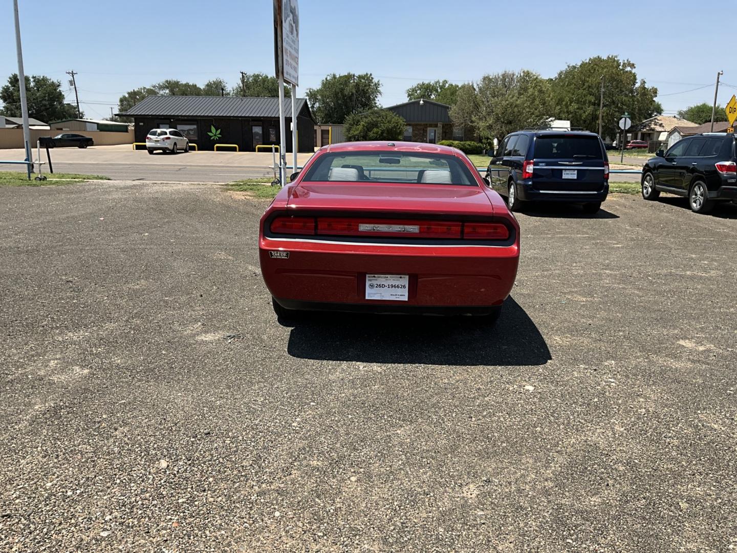 2010 Red Dodge Challenger SE (2B3CJ4DVXAH) with an 3.5L V6 SOHC 24V engine, 4A transmission, located at 821 N. Prince Street, Clovis, NM, 88101, (575) 762-8852, 34.406643, -103.195999- Photo#1
