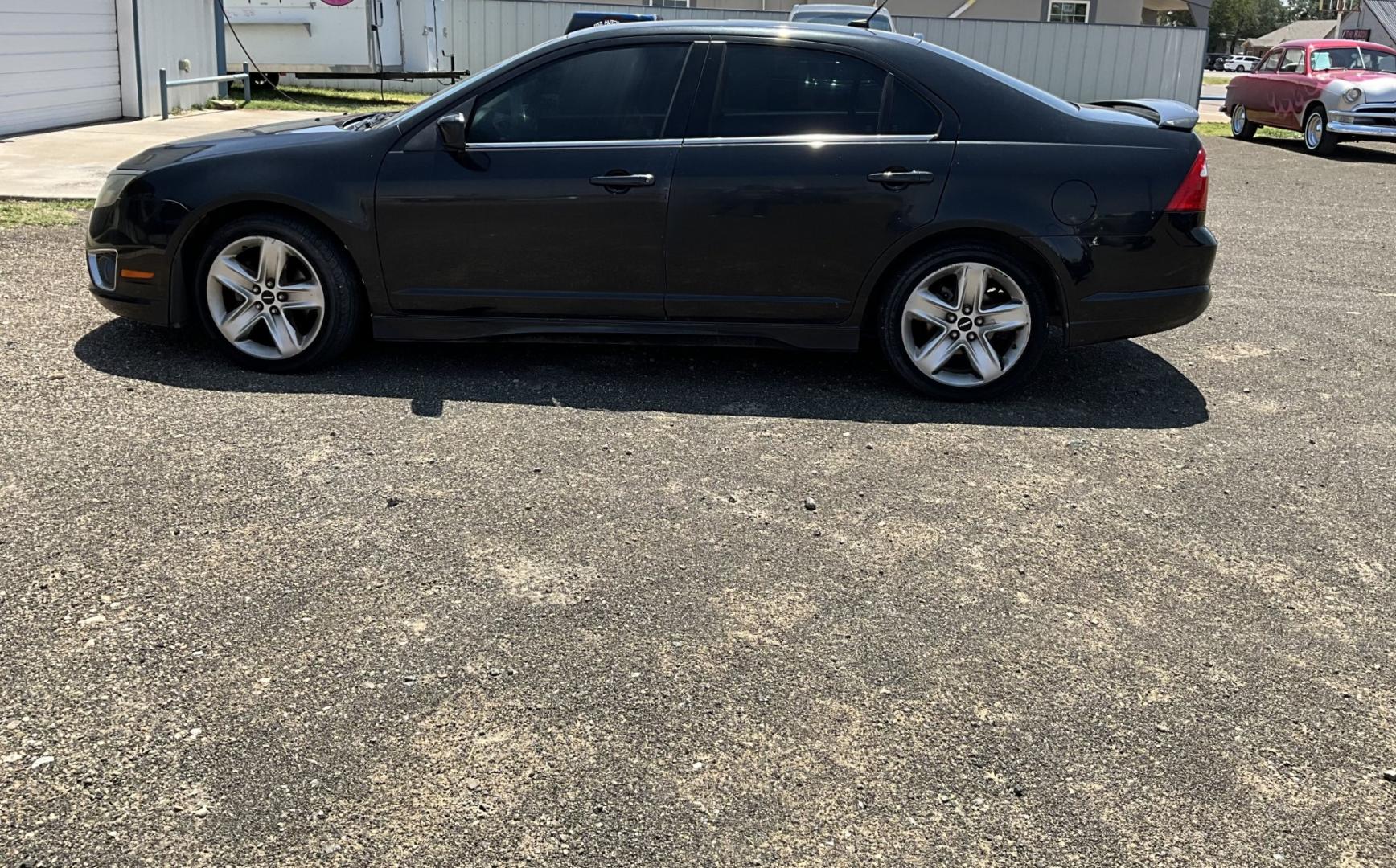2010 Black Ford Fusion V6 Sport FWD (3FAHP0KC2AR) with an 3.5L V6 DOHC 24V engine, located at 821 N. Prince Street, Clovis, NM, 88101, (575) 762-8852, 34.406643, -103.195999- Photo#2
