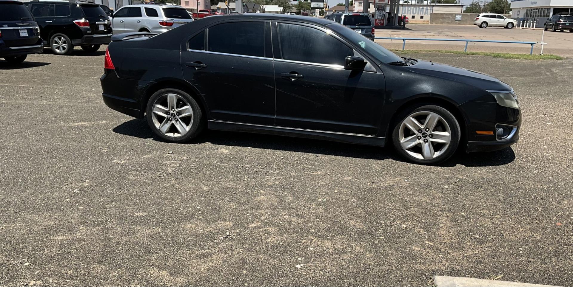 2010 Black Ford Fusion V6 Sport FWD (3FAHP0KC2AR) with an 3.5L V6 DOHC 24V engine, located at 821 N. Prince Street, Clovis, NM, 88101, (575) 762-8852, 34.406643, -103.195999- Photo#0