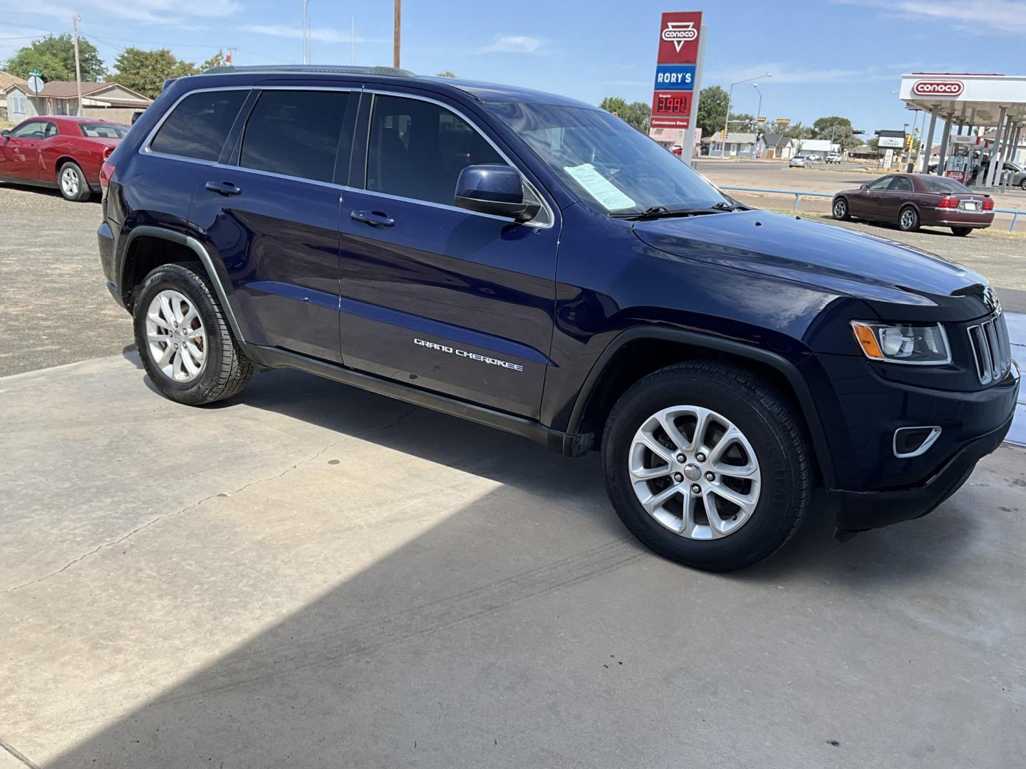2014 Blue Jeep Grand Cherokee Laredo 2WD (1C4RJEAG3EC) with an 3.6L V6 DOHC 24V engine, 5-Speed Automatic transmission, located at 821 N. Prince Street, Clovis, NM, 88101, (575) 762-8852, 34.406643, -103.195999- Photo#5