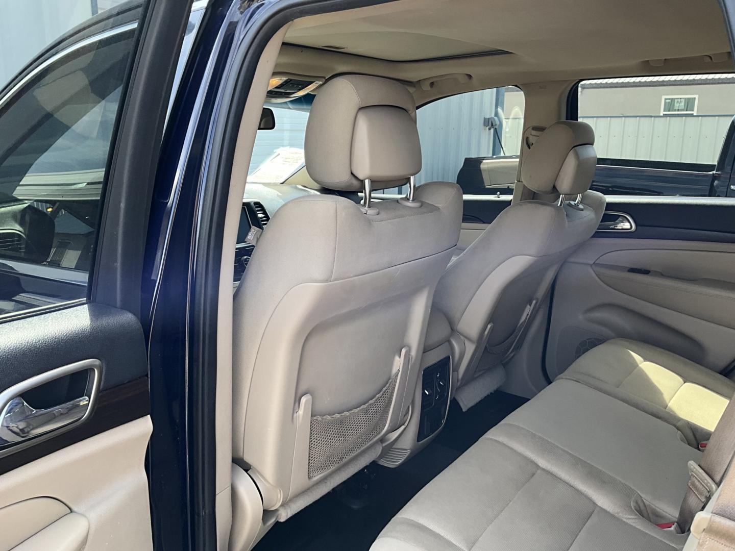 2014 Blue Jeep Grand Cherokee Laredo 2WD (1C4RJEAG3EC) with an 3.6L V6 DOHC 24V engine, 5-Speed Automatic transmission, located at 821 N. Prince Street, Clovis, NM, 88101, (575) 762-8852, 34.406643, -103.195999- Photo#4